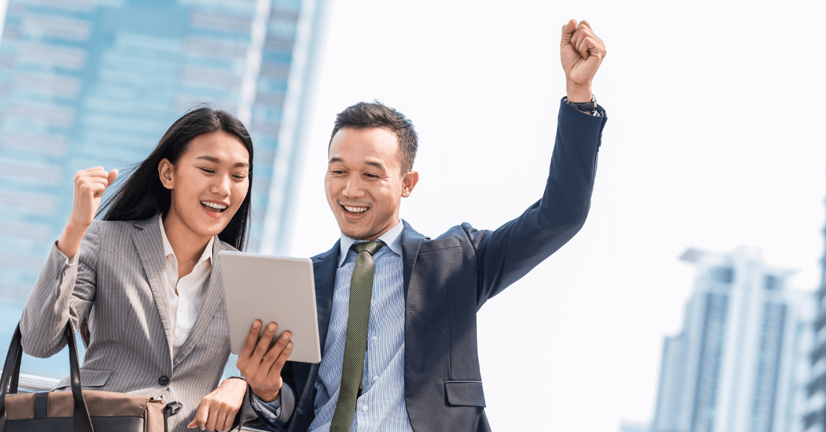 Two colleagues celebrating